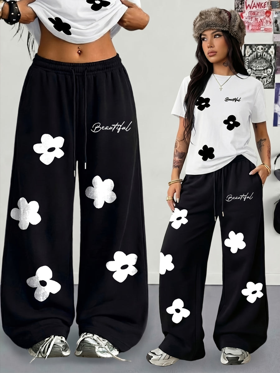 Spring/Summer New Set: 2pcs Outfit Featuring Hand-drawn Floral Print, Multi-color Round-neck Short-sleeve Top and Loose-fit Drawstring Straight-leg Pants. A Fashionable Y2K Streetwear Style with Hip-hop Y Vibes, Perfect for Summer Streetwear - White+black