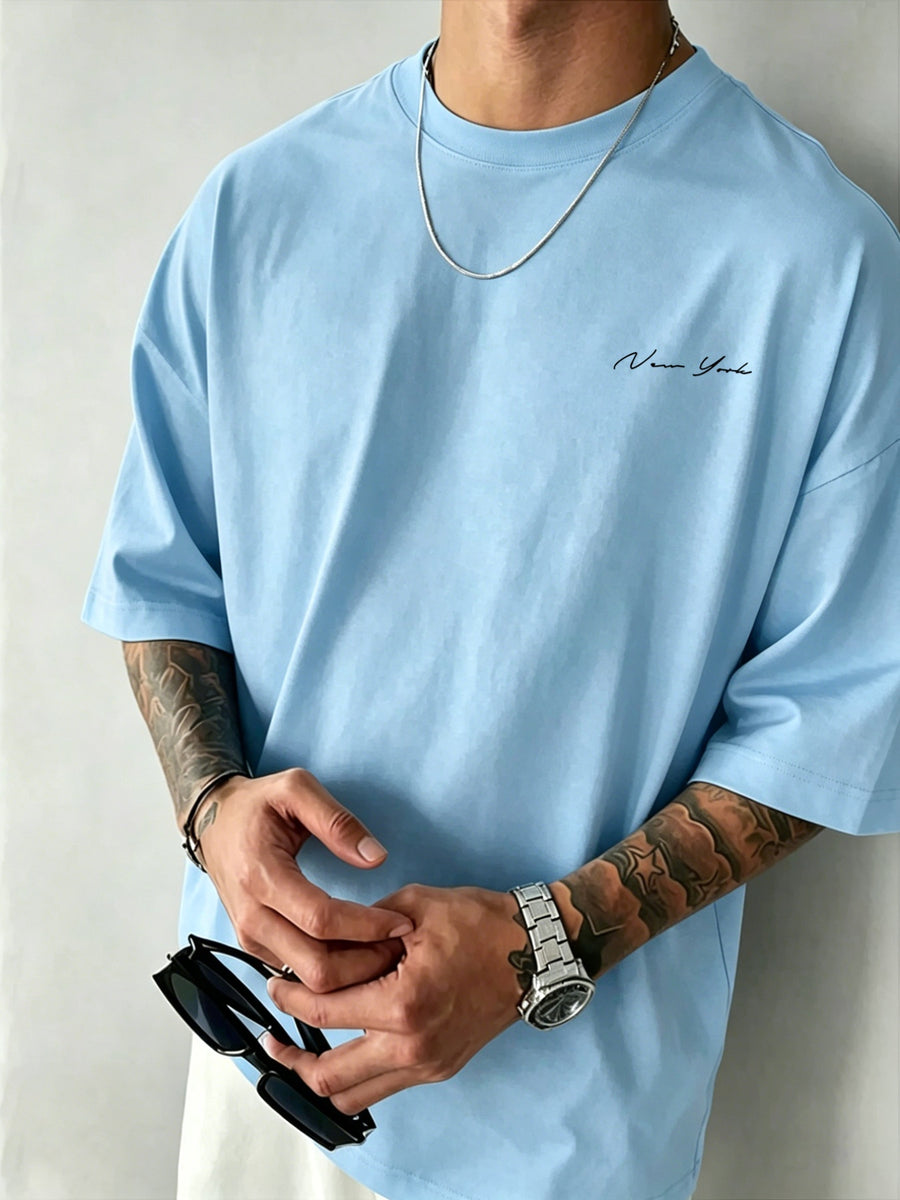 Men' New York Letter Print T-Shirt - Minimalist Round Neck Short Sleeve Tee with, Machine Washable Casual Basic Shirt Suitable for Summer, Office & Casual Attire, Non- Regular Fit for Men - Light Blue
