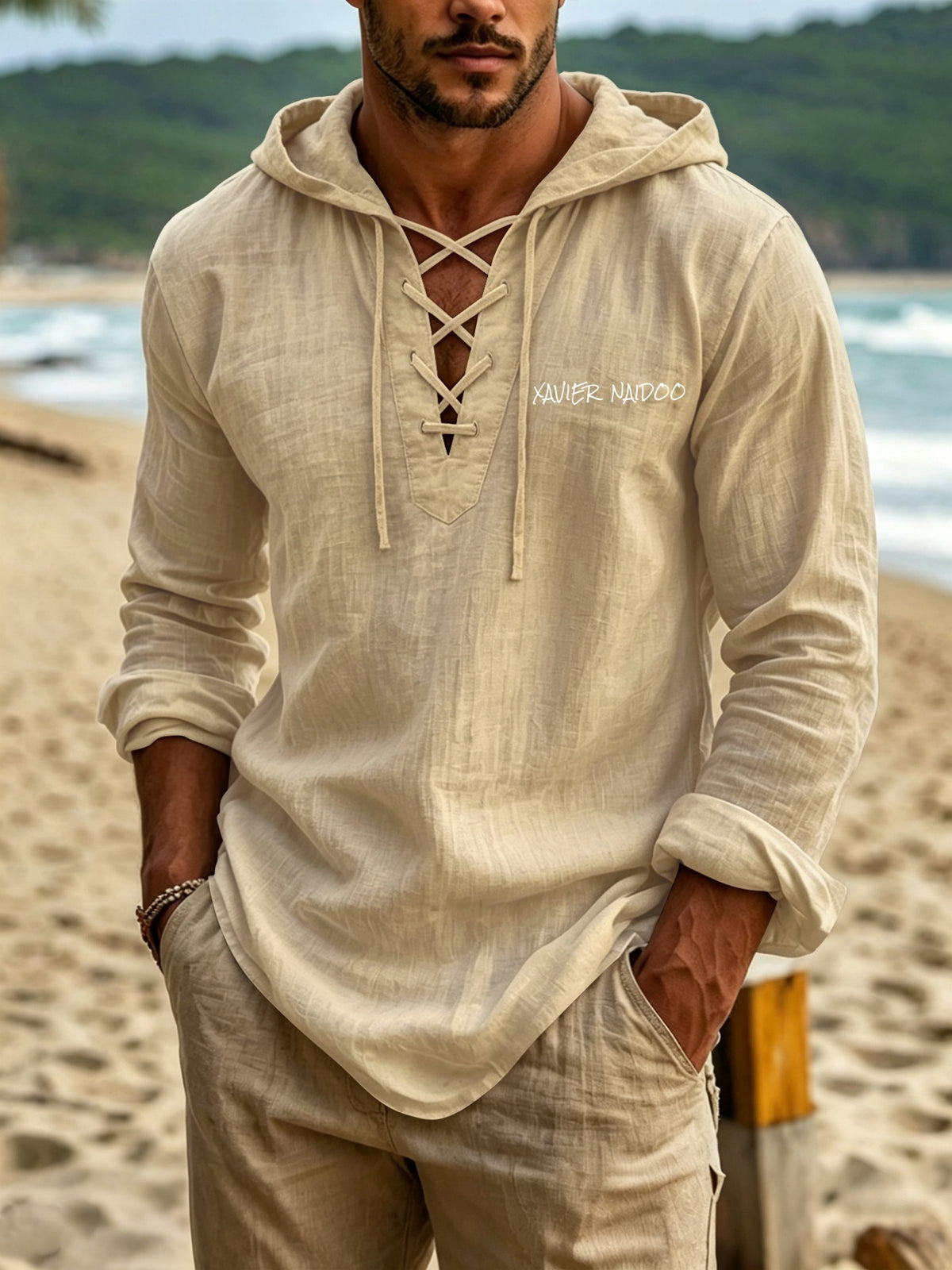 Minimalist Light Luxury Men's Linen Hooded Long-sleeve Garment. The Smooth Handwritten Letter Print on the Front Chest Enhances the Overall Style, While the Crisscross Tie-strap Construction Creates a Distinctive Neckline. The Long-sleeve Hooded - Khaki