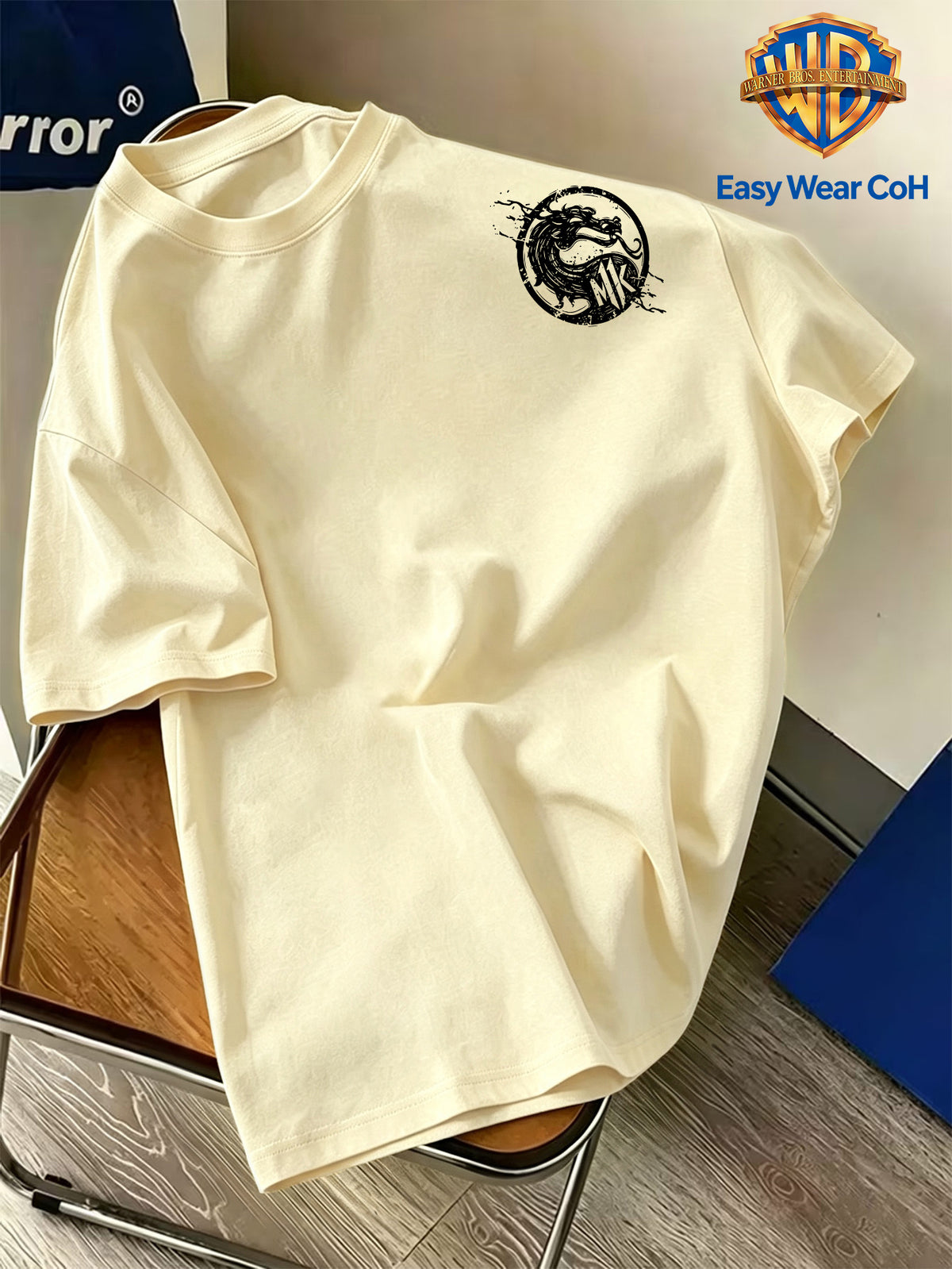 Warner Bros. Official Men's Double-Sided Front and Back Print Short-Sleeve T-Shirt, Featuring a Hand-Drawn Sketch Dragon Logo with a Splatter Ink Creative Design. The Handwritten Scrawl Lines Create a Rich Atmospheric Feel. The Fabric Is Breathable - Apricot