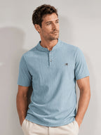 Men's Summer Textured Henley Short-Sleeve T-Shirt with Small Stand-Up Collar. Features a Simple and Elegant Two-button Placket, Vertical Ribbed Fabric on the Body for Breathability, Keeping You Cool and Sweat-free. Accented with a BUAND Brand Print - Sky Blue
