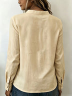 According ToFashionable V-neck Bamboo-joint Style Women's Long-sleeved Shirt - Off-white