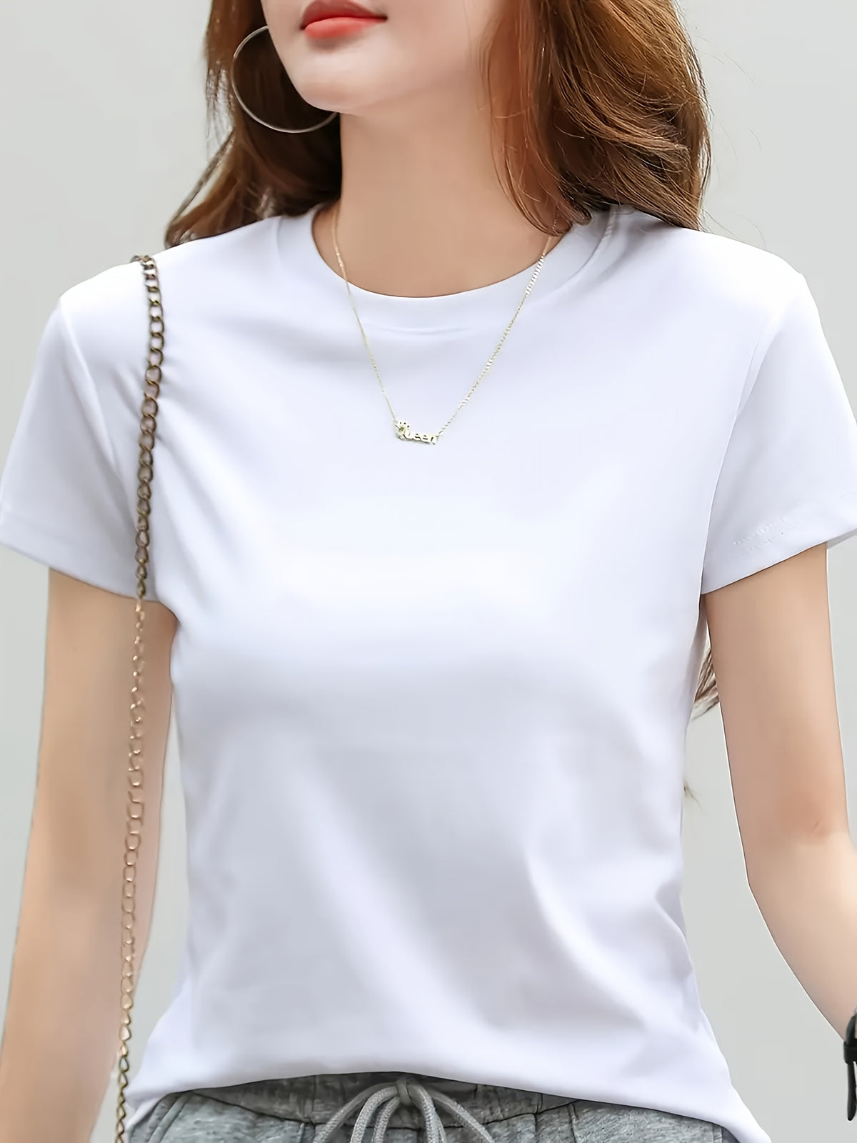 Women'S Fashionable Solid Color Round Neck Short Sleeved Top - White