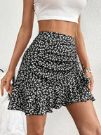 Elegant Special Vintage Floral Print Mini Skirt, Adorned with Delicate White Floral Patterns, Exudes a Fresh Vintage Vibe with an Inherent French-style Romantic Charm. The Side Gathers Feature a Clever Concealed Design That Subtly Flatters the Waist - Black