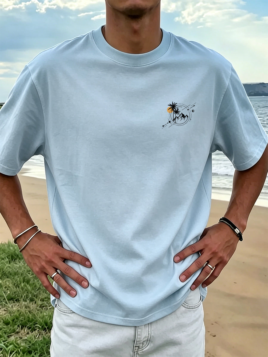 New Men's 100% Pure Cotton T-Shirt with Surfboard, Coconut Tree, and Sun Print, Comfortable and Breathable for Summer Casual Beach Vacations - Light Blue Color