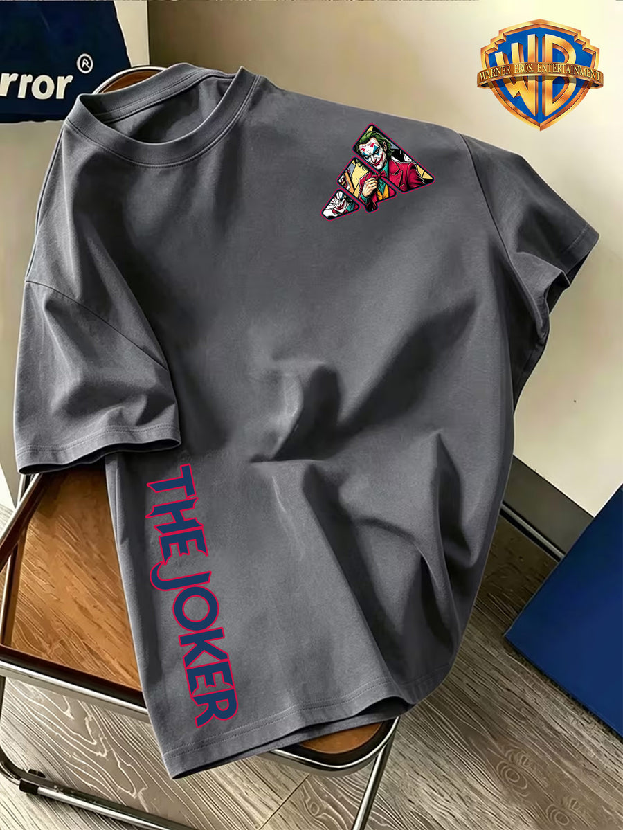 Warner Bros. Official Double-Sided Print Men's Short-Sleeve T-Shirt, Featuring a Triangular Frame Patchwork Design with a DC Comics Classic Panel-style Joker Image Creatively Paired with "THE JOKER" Lettering Print for a Complementary Look. - Dark Gray