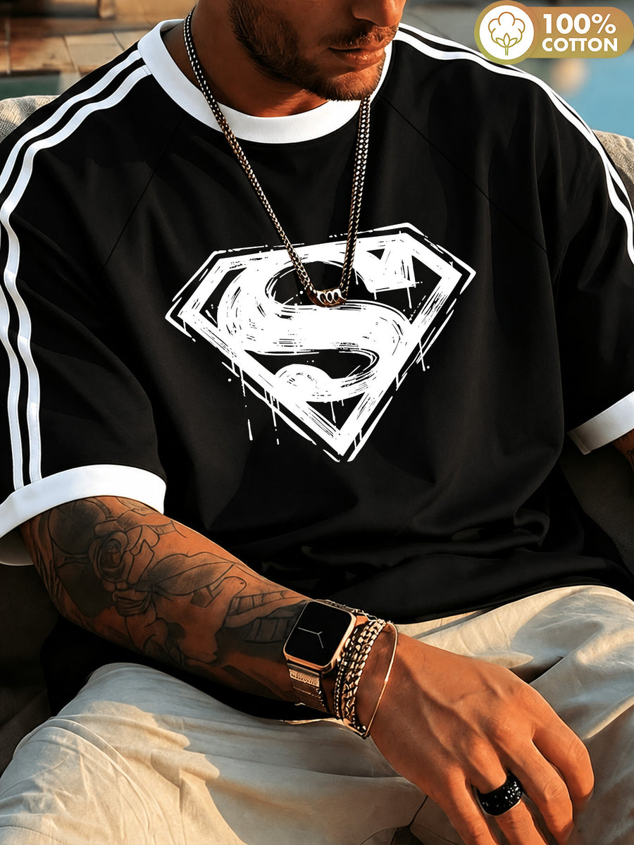 Officially Licensed by Warner Bros., Featuring a Superman 'S' Logo Brushstroke-Style Splatter Print; Men'S 100% Crew-Neck Short-Sleeve T-Shirt, Wrinkle-Resistant, Comfortable, And Breathable, with Striped Drop-Shoulder Sleeves - Black
