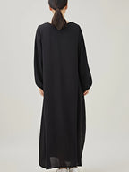 Comfortable & Casual Solid Color Muslim Dress with Bubble Pleats, Elastic Cuffs, and Flowy Hem - Polyester, Machine Washable - Black