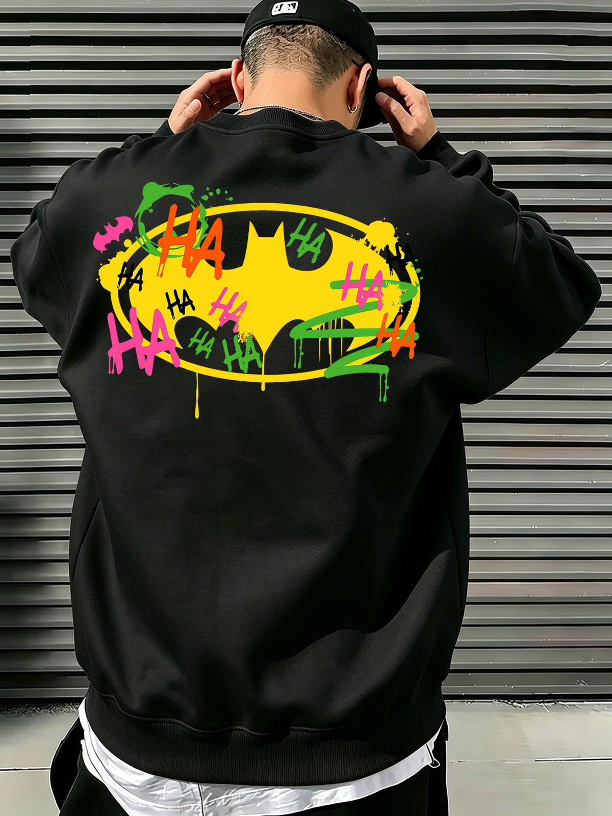 Official Warner Bros. Men's Fashion Trend Loose Fit Crew Neck Sweatshirt, Batman Joker HA Graffiti Ink Splatter Bat Logo Print Design, Versatile Long Sleeve Crew Neck Sweatshirt for Sports, Leisure, Commuting, Spring, Autumn, and Winter - Black