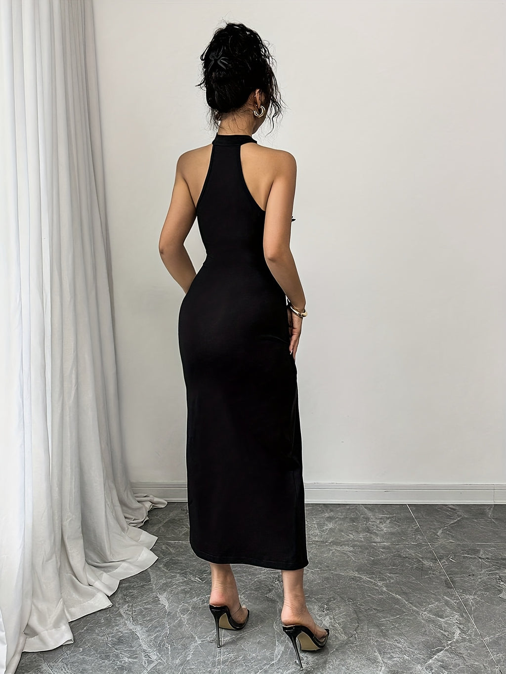 A Woman'S Dress Adorned with Lace Decorations, Featuring a Sexy Design - Black