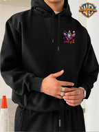 Warner Bros. Official Licensed Men'S Hoodie, Halloween Splatter Graffiti Theme Multi-Version Clown Head, Featuring Spider, Web, Candy, Pumpkin And Other Halloween Elements, Dripping Paint Effect Pattern Print, Street Style Men'S Pullover Hoodie - Black