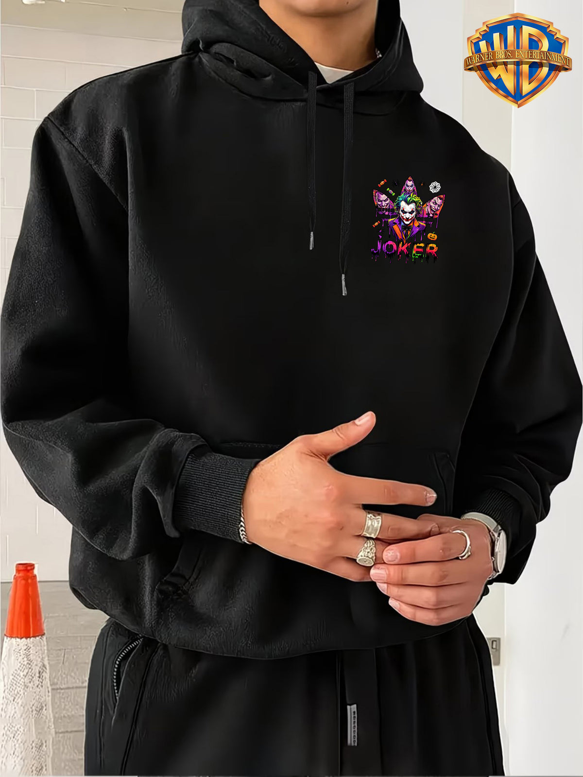 Warner Bros. Official Licensed Men'S Hoodie, Halloween Splatter Graffiti Theme Multi-Version Clown Head, Featuring Spider, Web, Candy, Pumpkin And Other Halloween Elements, Dripping Paint Effect Pattern Print, Street Style Men'S Pullover Hoodie - Black