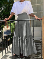 The Women'S Skirt Features a Minimalist Design, Suitable for Various Everyday Occasions, Embodying a Vintage French Style. It Has a High-Waisted Silhouette with an Elastic Waistband, Exuding Elegance And Sweetness. Perfect for Spring And Autumn - Black And White