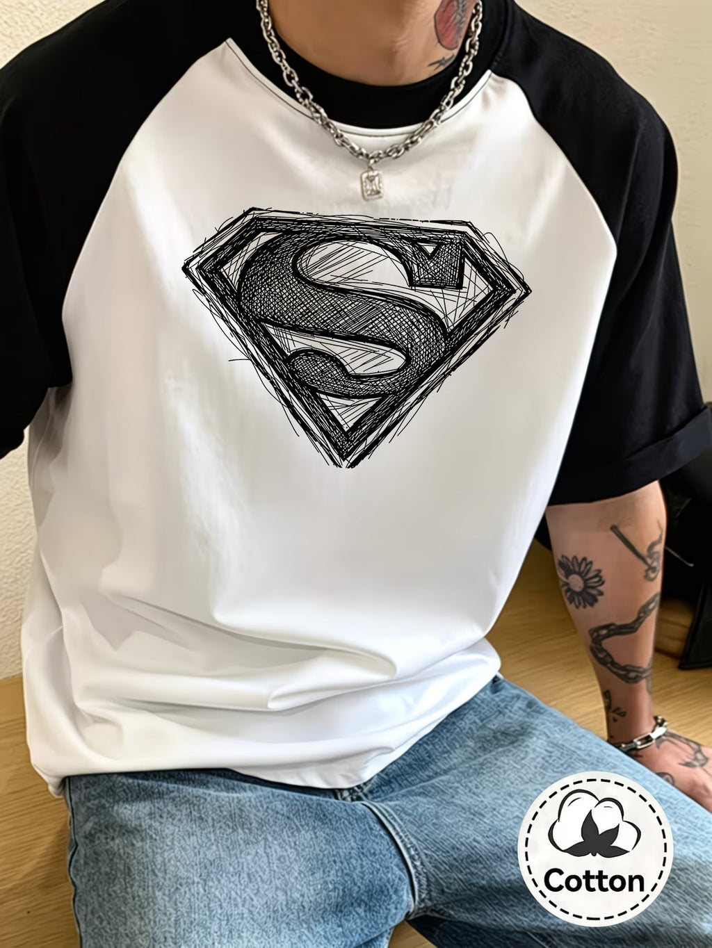 WB Warner Men's & Unisex Superman S Shield Logo T-Shirt - 100% Short Sleeve Casual Round Neck Tee with Iconic Superman Emblem Print, Color-Block Raglan Sleeve Top Suitable for Daily Wear,, and Themed Outfits - White Fight Black