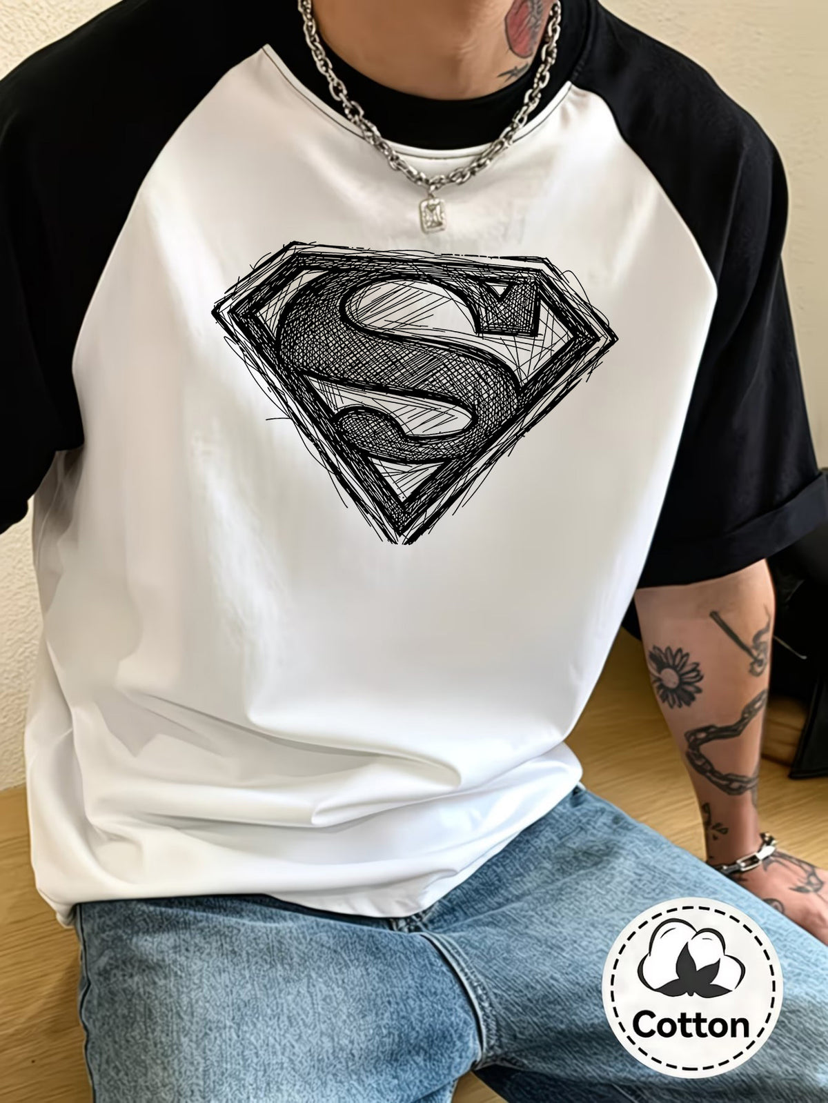 WB Warner Men's & Unisex Superman S Shield Logo T-Shirt - 100% Short Sleeve Casual Round Neck Tee with Iconic Superman Emblem Print, Color-Block Raglan Sleeve Top Suitable for Daily Wear,, and Themed Outfits - White Fight Black