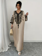 Exclusive BK090550 Elegant Women's Abaya, Bohemian Style with V-Neck and Long Sleeves, Ethnic Print, Machine Washable, Traditional Dress for All Seasons, Modest Clothing with Intricate Pattern Design, Ideal for Casual and Formal Wear - Apricot