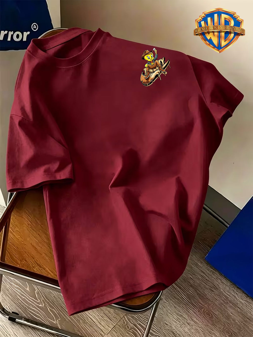 Warner Bros. Official Men's Short-Sleeve T-Shirt with Front and Back Print. Features a Creative  Core Western Cowboy Style Design with  Bird Holding Playing Cards. The Vibrant Print Creates a Strong Atmosphere, Making the Shirt Eye-catching - Burgundy
