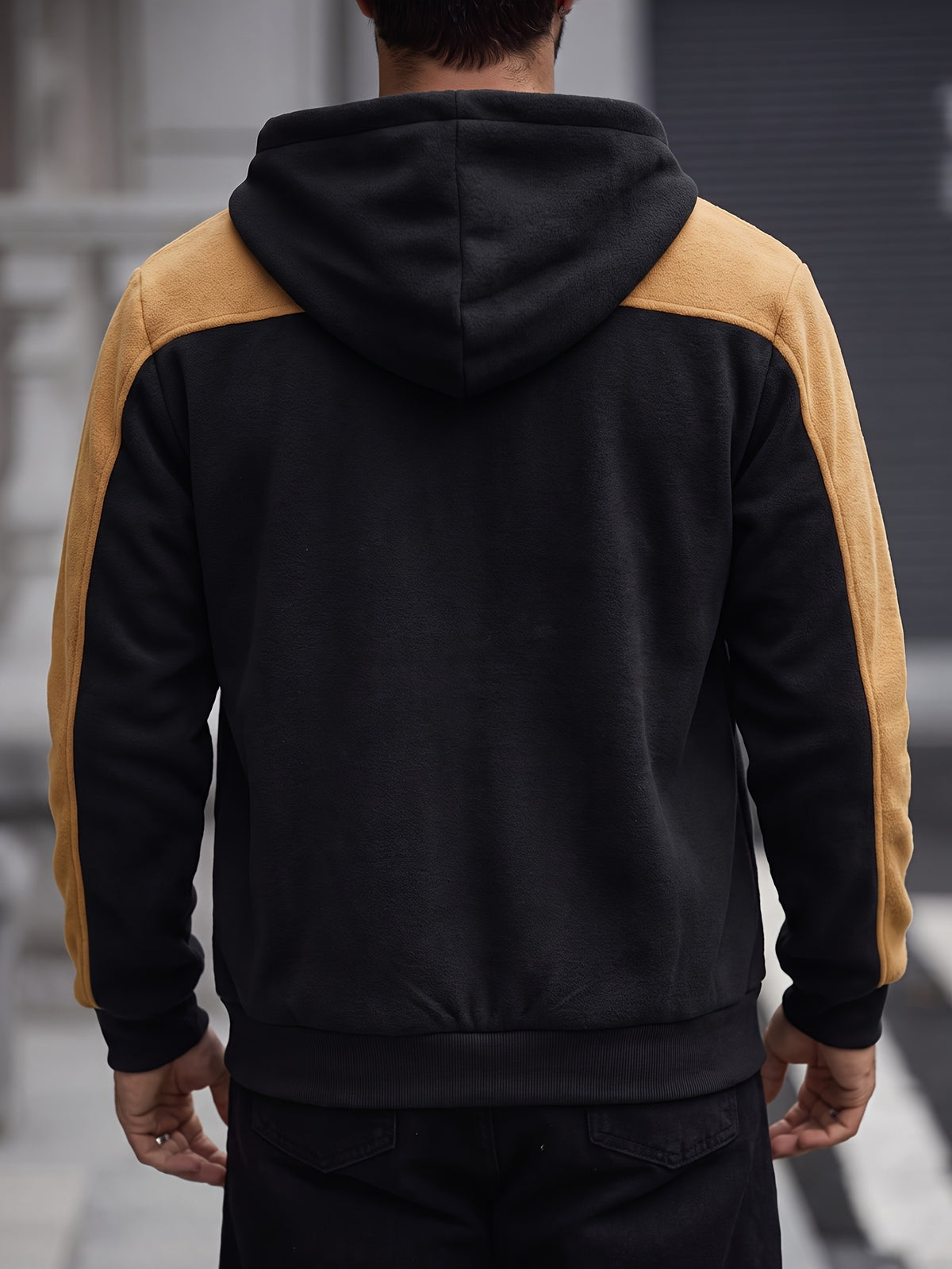 Men's Trendy Color-Block Hooded Jacket New Arrival! The Black-and-brown Spliced Design Offers a Strong Visual Sense of Layering, with Smooth Fabric for a Comfortable and Stylish Fit. The Full-length Zipper and Pockets Are Both Practical - Black