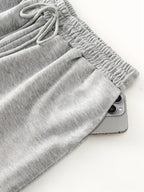 Women's High-Waisted Wide-Leg Joggers with Stretch Waist & Pockets - Solid Color Loose Pants Suitable for All-Season Wear, Straight Leg Trousers, Machine Washable for,, Everyday Casual (No Transparency) - Grey