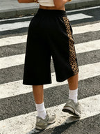 Women's Vintage Leopard Print Wide-Leg Bermuda Shorts with Elastic Waist & Side Panel Sweatpants - Loose Fit Track Pants Suitable for, Streetwear, Casual Outfits - Machine Washable - - Black