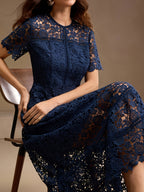 French Lace Cut-out Dress, with a Fashionable Ruffled Panel Design, Features a Flattering Waistline for an Elegant Look, Perfect for Any Formal Occasion. Women's Fashion Must-have - Navy Color