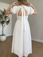 Eyelet Embroidered Round Neck Puff Sleeve Smocked Waist Open Back Bow Tie A-Line Midi Dress - White