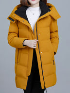 Women's Hooded Mid-Length Padded Coat with Black Contrast Lining, Zipper and Snap Button Double Front Placket, Plus Size Loose Fit, Checkered Overlock Stitching with Anti-Slip Padding, Drawstring Adjustable Hem, Zippered Side Pockets - Yellow