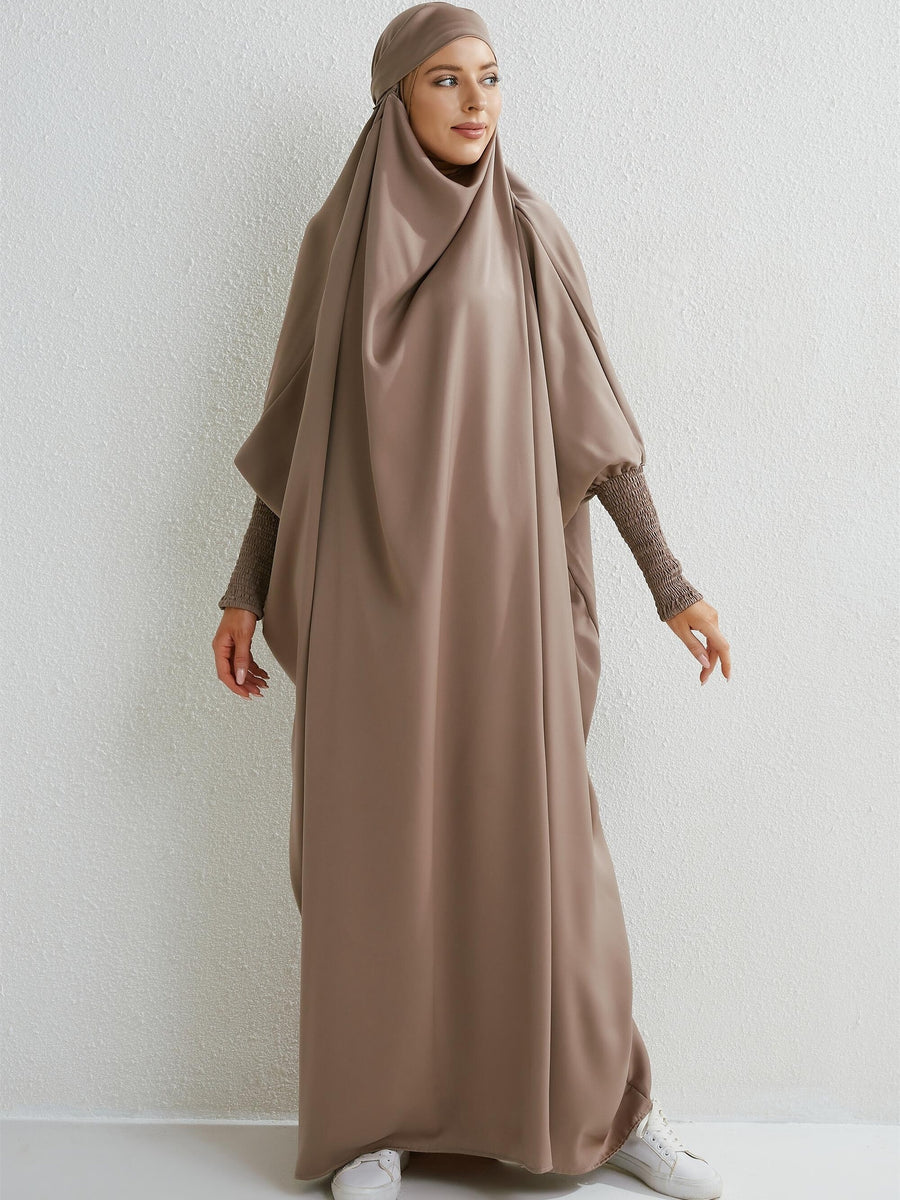 Islamic Attire for Women Featuring a Hooded Jilbab with Smocking Sleeves, Designed for Prayer, Suitable for Modesty in Dubai And Saudi Arabia, Available in Black - Taro