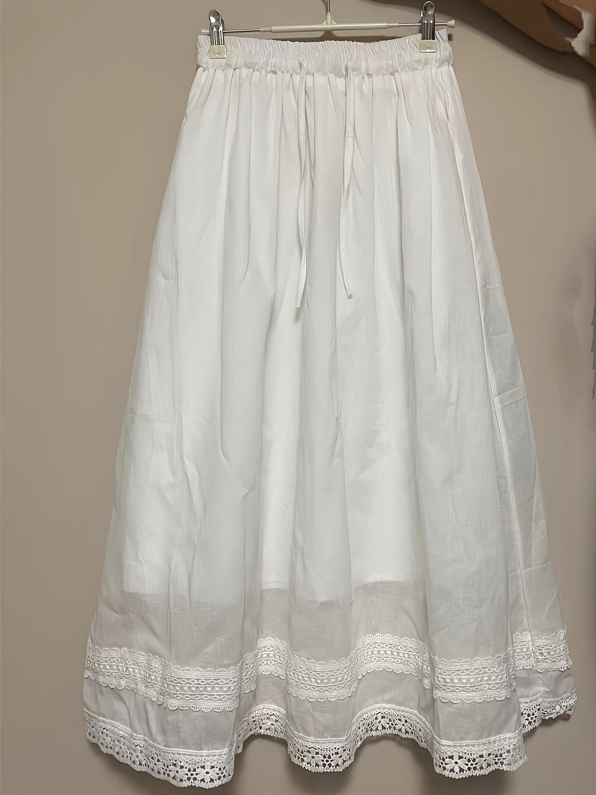 In Soft Pink Tones, Like a Dreamy Landscape, Comfortable And Skin-Friendly, Outlining a Casual Silhouette, with The Hem Adorned Like Flowers Blooming in a Green Field. This Skirt Is a Blend of Fashion And Comfort, Allowing You to Wear Romance And Em - White