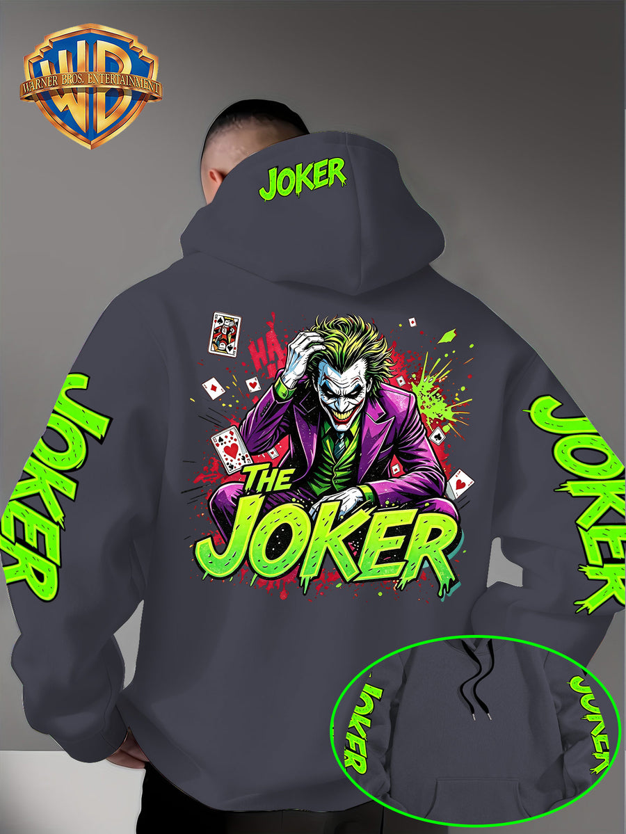Official Warner Bros. Joker Comic-style Print Featuring Red and Green Ink-splatter Effects and "THE JOKER" Lettering. The Sleeves and Back of the Hood Are Adorned with Green "JOKER" Lettering. This Men's Trendy Printed Hooded Sweatshirt Features - Dark Gray