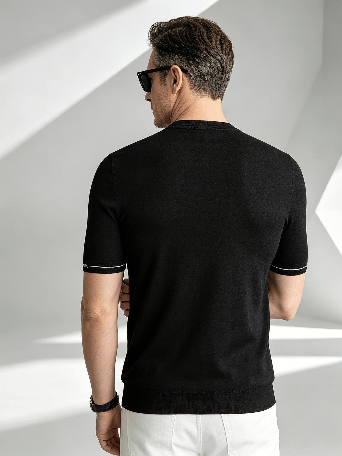 Business-casual Men's Crew Neck Short-sleeve Knit T-shirt, Slim-fit Lightweight and Breathable Knit Top, with Contrast-color Stitching and Letter Embroidery on the Cuffs, Suitable for Daily Wear, Office, and Weekend Outings in Summer - Black