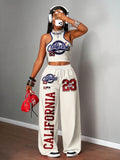 A Two-Piece Set for Women Consisting of a Casual Tank Top And Long Pants, Featuring a Regular Fit, Printed with The Number '23' And Letter Patterns, Using Digital Printing Technology, Stylish And Comfortable, Perfect for Everyday Wear - Apricot