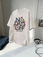 Men's Washed Short-sleeve T-shirt, Made of Pure Cotton for Breathability and Skin-friendly Comfort. Features a Relaxed Fit for Versatile Wear. Front Print with "NO DAYS OFF" Motivational Text and Gear Stopwatch Elements Exuding a Powerful Vibe - Apricot