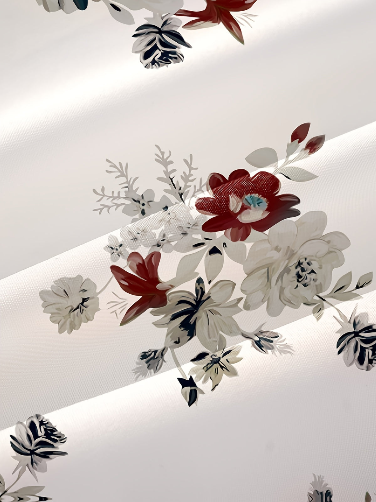 A Stylish And Elegant Women'S Shirt Featuring Beautiful Floral Prints - White