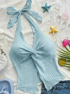 Fashionable And Sexy Sleeveless Top with a Tie, Twisted Hem, Side Slits, And an Open Back - Light Blue