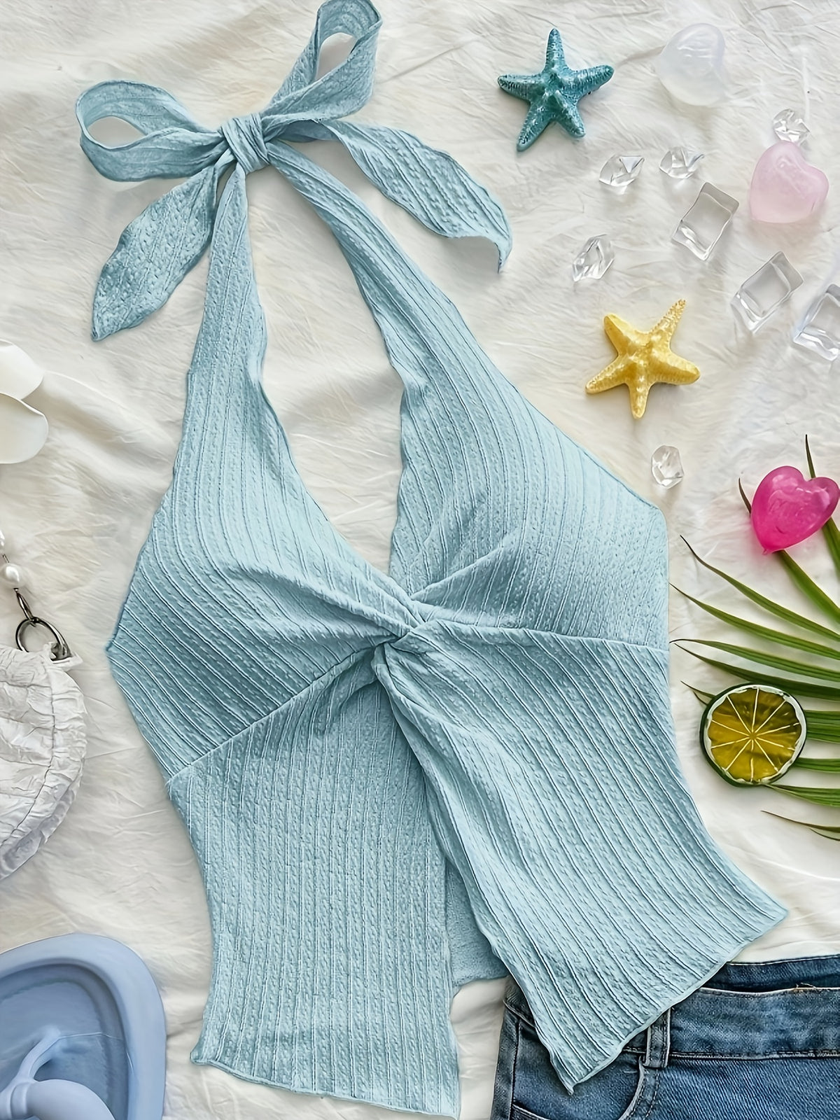 Fashionable And Sexy Sleeveless Top with a Tie, Twisted Hem, Side Slits, And an Open Back - Light Blue