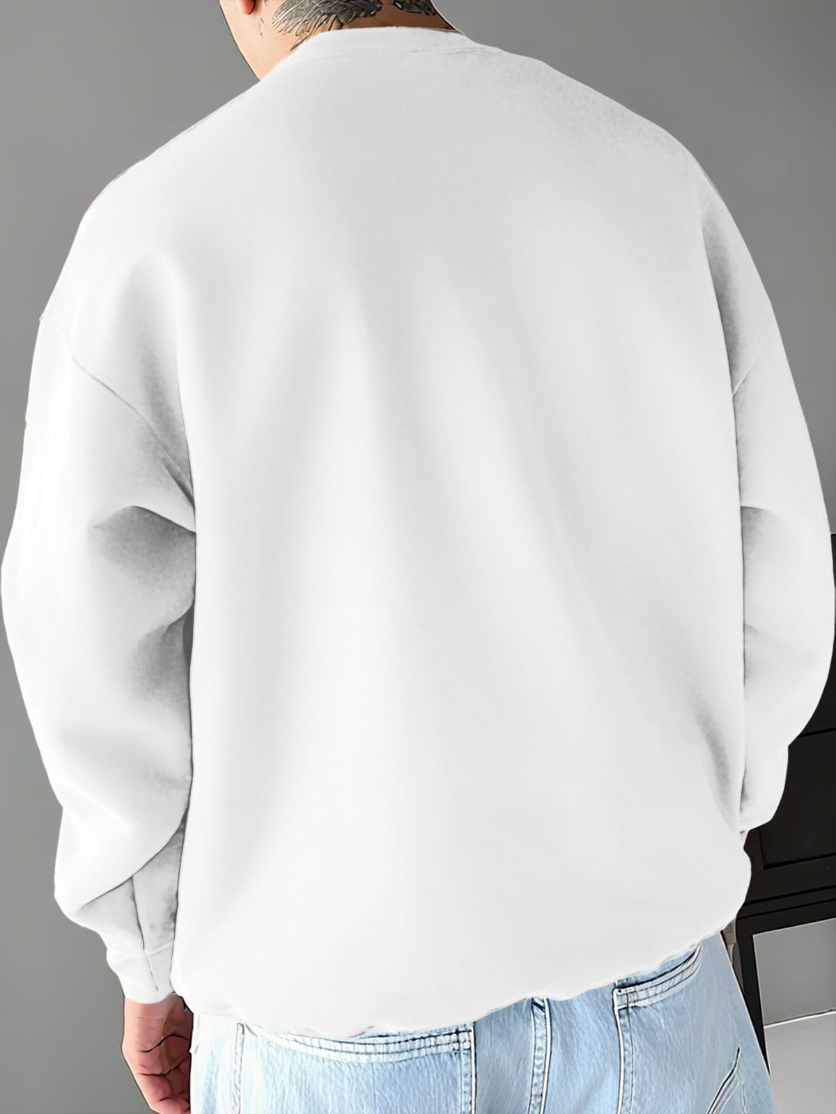 A Men's Crewneck Sweatshirt with a Streetwear-style Creative Patch Featuring a Small Bear Print - White