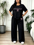 Women'S Plus Size Casual Loose Pajama Set, Letter And Bow Theme Printed Loose Round Neck Short Sleeve And Long Pants, Suitable for Spring Summer Fall, Machine Washable And Dry Cleanable - Black