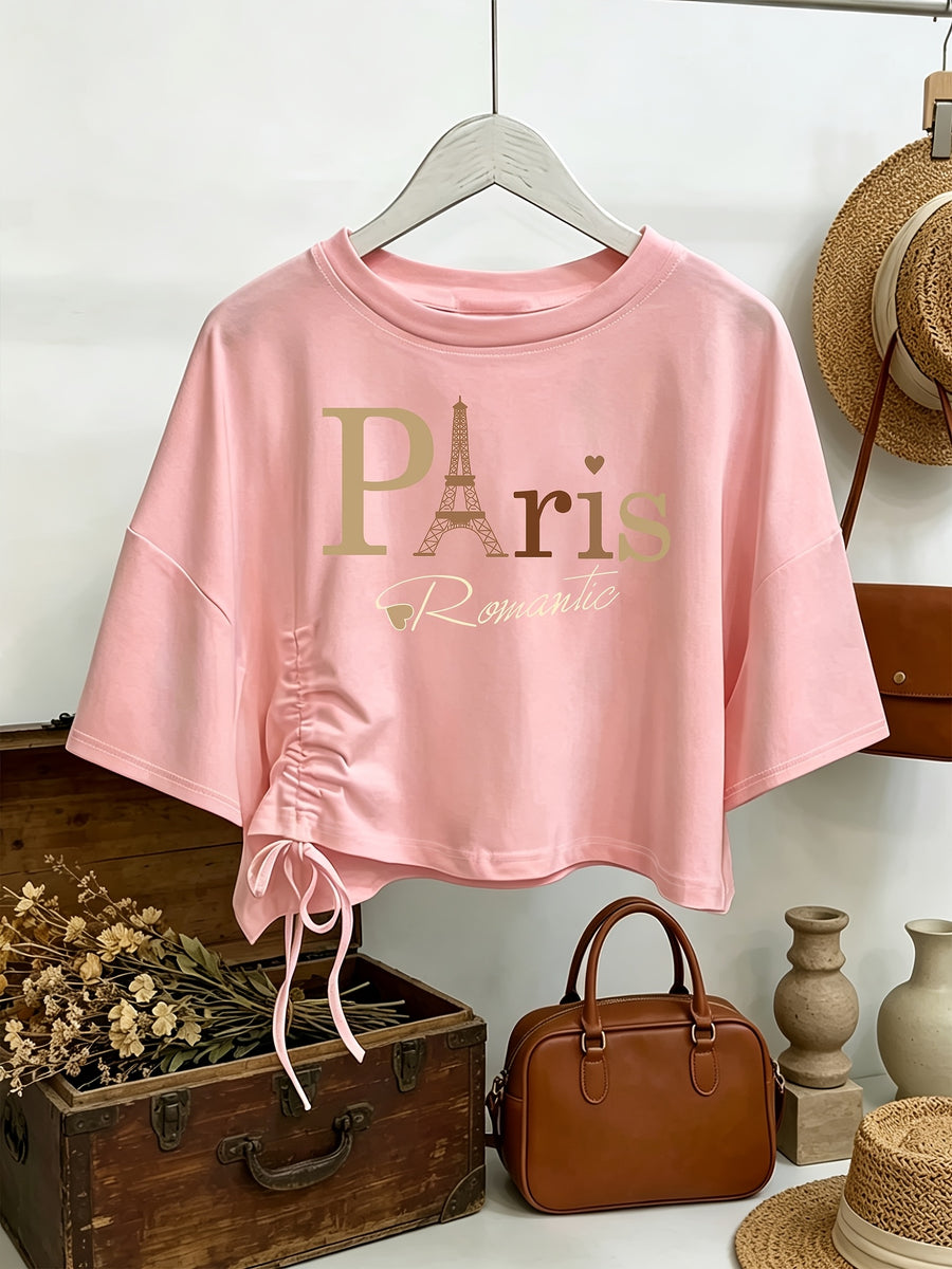 Women's French Paris T-Shirt with Eiffel Tower & Gradient Lettering - Loose-Fit Short Sleeve Top, Drawstring Hem & Exposed Waist Design, Soft Machine-Washable Blouse Suitable for Travel, Beach, Vacation, Casual French Outfits - Peach