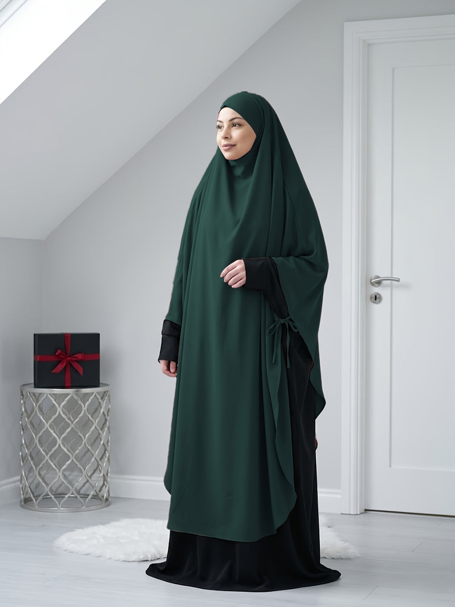 A Solid Color Nidaga Prayer Jilbab. The Fabric Is Skin-friendly and Breathable, Making It Suitable for Women to Wear and Pray Daily. The Robe Abaya Features a 1pc Design with a Khimar, Offering a Strong Drape and a Loose Fit, Ideal for Busy Daily - Dark Green