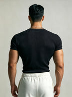 Men's Slim-Fit Henley Neck Knit Short-Sleeve T-Shirt. High-stretch Ribbed Fabric Accentuates Muscle Definition, Breathable and Sweat-wicking for a Non-stuffy Feel. Suitable for Multiple Occasions Including Fitness Training, Daily Commutes, Spring - Black