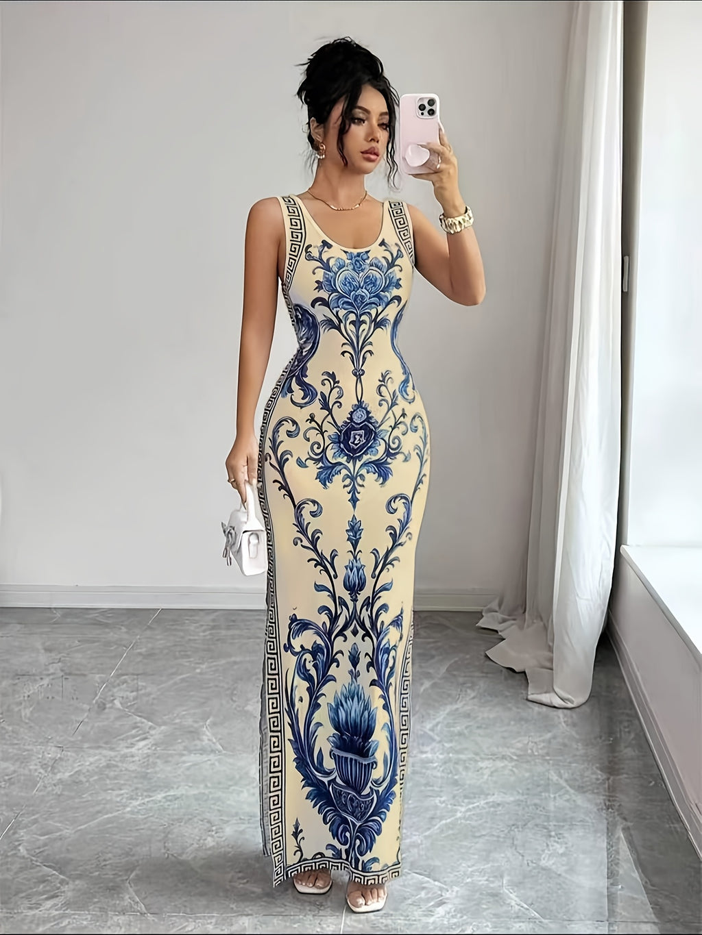 Elegant And Refined Sleeveless Round-Neck Slim-Fit Long Floral Print Dress with Side Slit. A Sophisticated Fashion Piece Perfect As a Bridesmaid Gown for Evening Galas, Parties, Vacations, And Beachside Wear - Blue