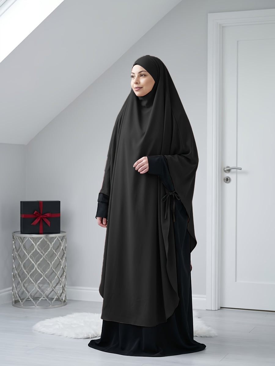 A Solid Color Nidaga Prayer Jilbab. The Fabric Is Skin-friendly and Breathable, Making It Suitable for Women to Wear and Pray Daily. The Robe Abaya Features a 1pc Design with a Khimar, Offering a Strong Drape and a Loose Fit, Ideal for Busy Daily - Black
