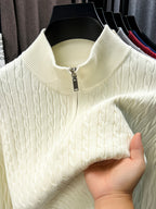 Half-zip Cable-knit Sweater, Fully Constructed with Herringbone Cable Stitching for a Strong Three-dimensional Texture. Compared to a Stockinette Sweater, It Has a More Vintage Feel. The Slightly Relaxed Fit Offers Good Forgiveness for Body Shapes - White