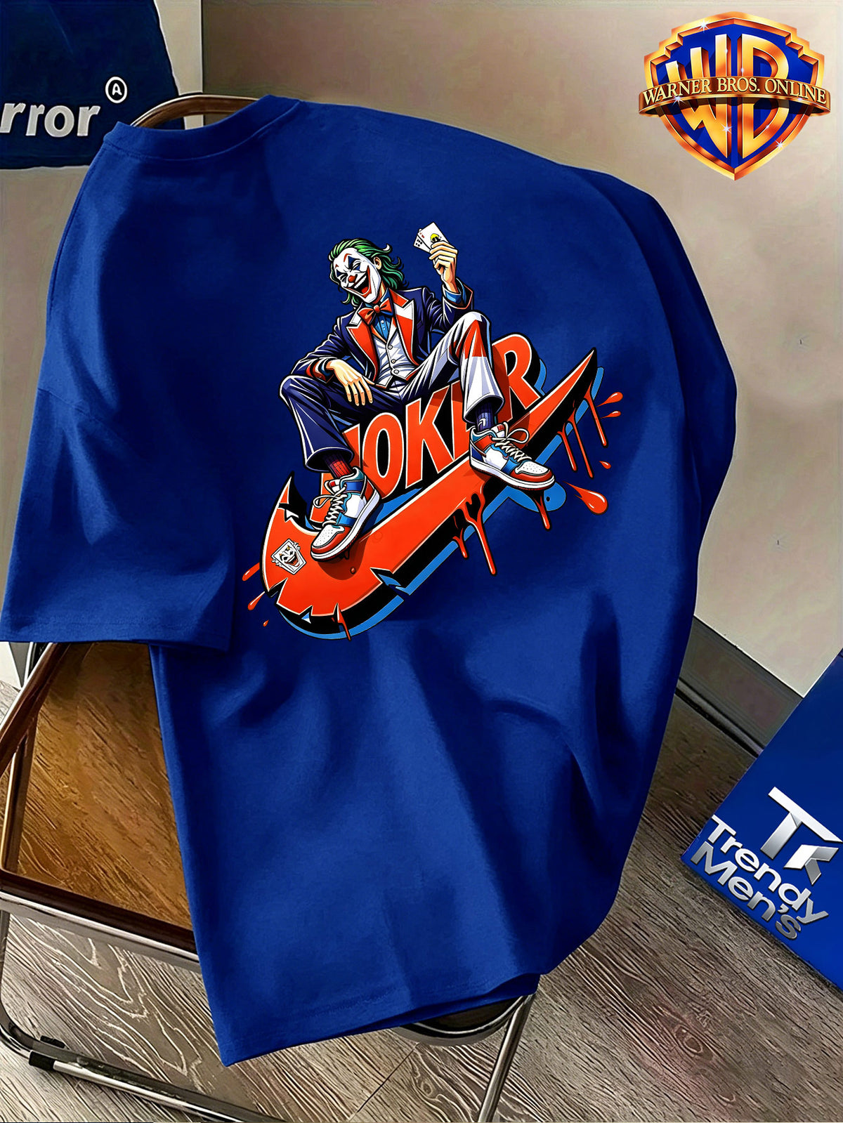 Warner Bros. Authentic Men's 100% Short-Sleeve T-Shirt, Trendy Hip-Hop Character Top, Featuring a Dominant Seated Figure Holding Playing Card Accessories, Adorned with Red-Orange Color-Block Dripping Enamel Paint Patterns, Exceptional Visual Impact - Royal Blue
