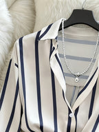 [Development ZD251208042] Glovely Striped Shirt + Asymmetrical Pleated Skort Elegant Women's 2pcs Set - Apricot
