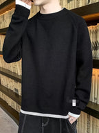 This Autumn and Winter Knitted Sweater for Men Features a Round Neck, Long Sleeves, and White Stitching at the Hem. It's a Trendy and Stylish Regular Style for Men - Black+White