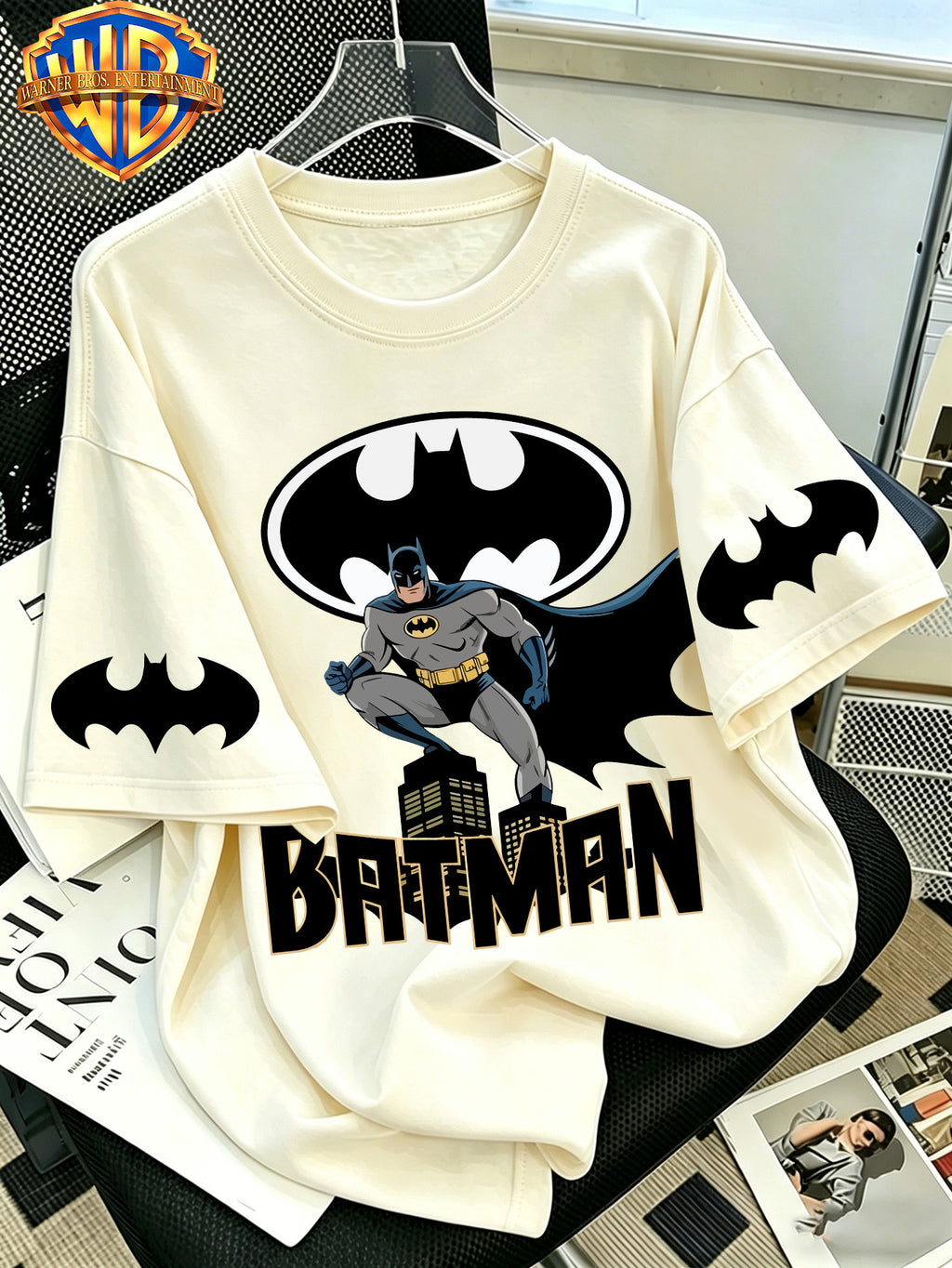 Official WB. Men's Short-sleeve T-shirt with Fun Cartoon Print Featuring the DC Batman Logo Character. Round-neck Top Suitable for Men's Casual Summer Daily Commutes, Home Wear, and Office Outfits - Apricot