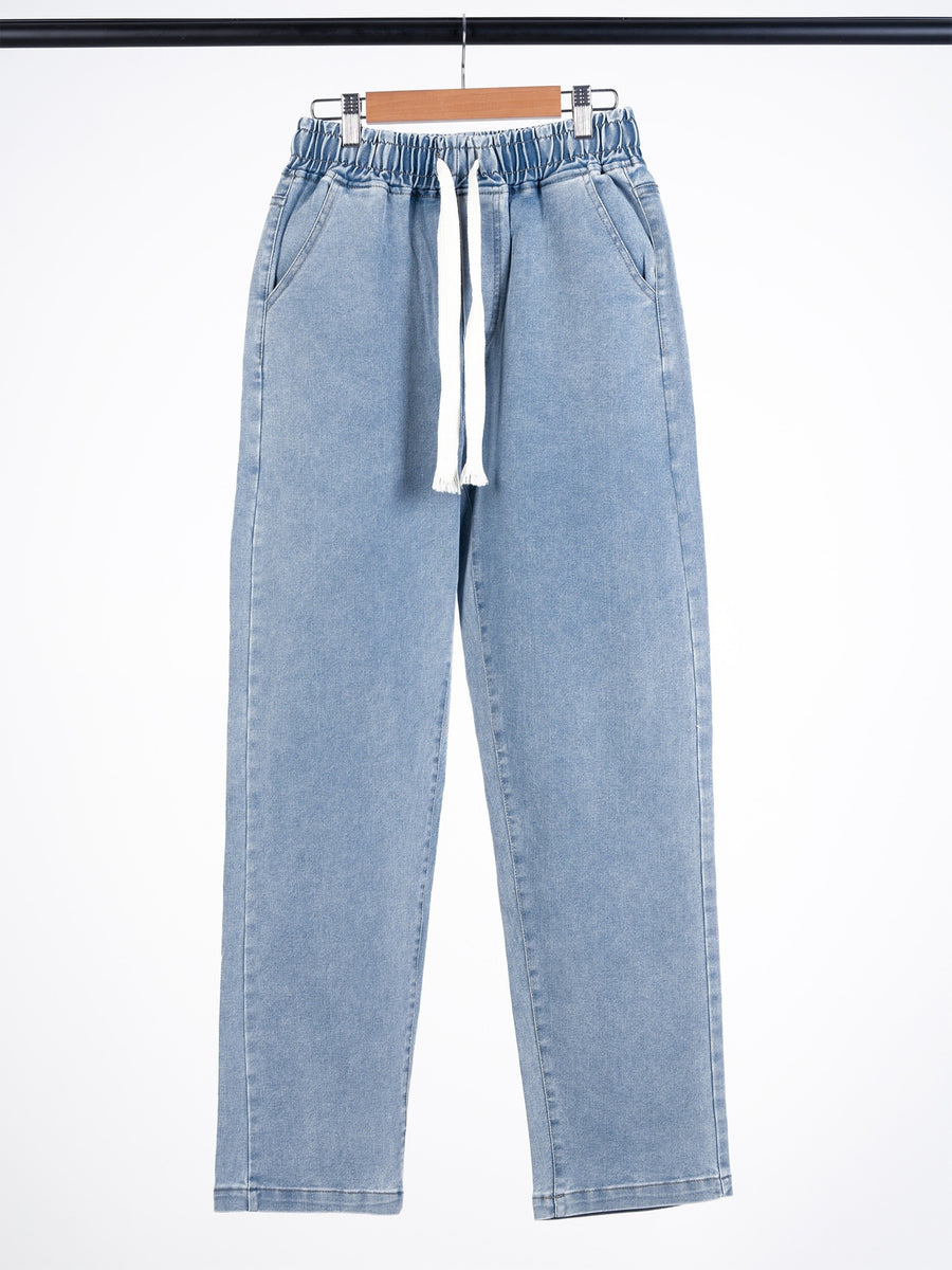 Vintage Denim Pants, American Unisex Style, Loose-fitting Casual Trousers. Washed and Distressed for a Vintage Look, with a Three-dimensional Fit That Wraps Around the Hips. Highly Breathable, with Extra-large Size and Ample Elasticity, Suitable for - Light Blue