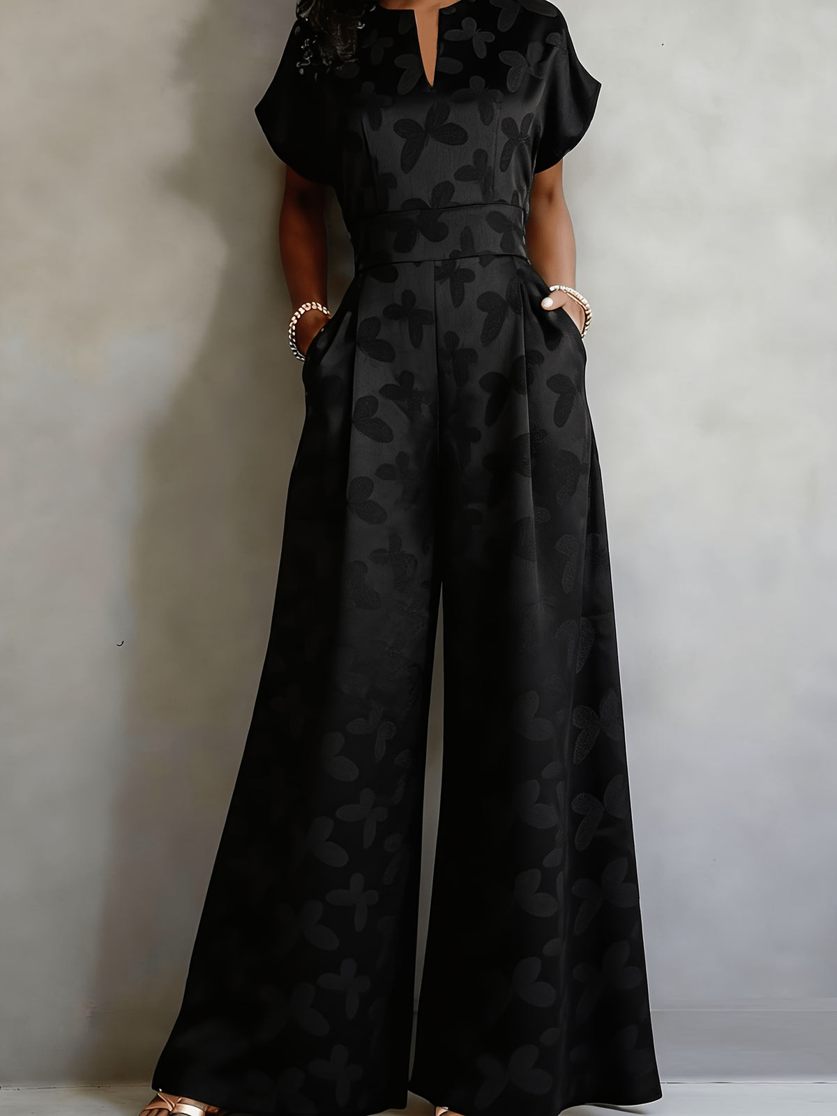 New Spring/Summer 2026 Women's Jacquard Short-Sleeve Jumpsuit with Subtle Butterfly Pattern, V-Neck, Cinched Waist, and Wide-Leg Pants. This Light Luxury, High-end Jumpsuit Offers a Sophisticated Look for Commuting. The Simple and Exquisite V-neck - Black